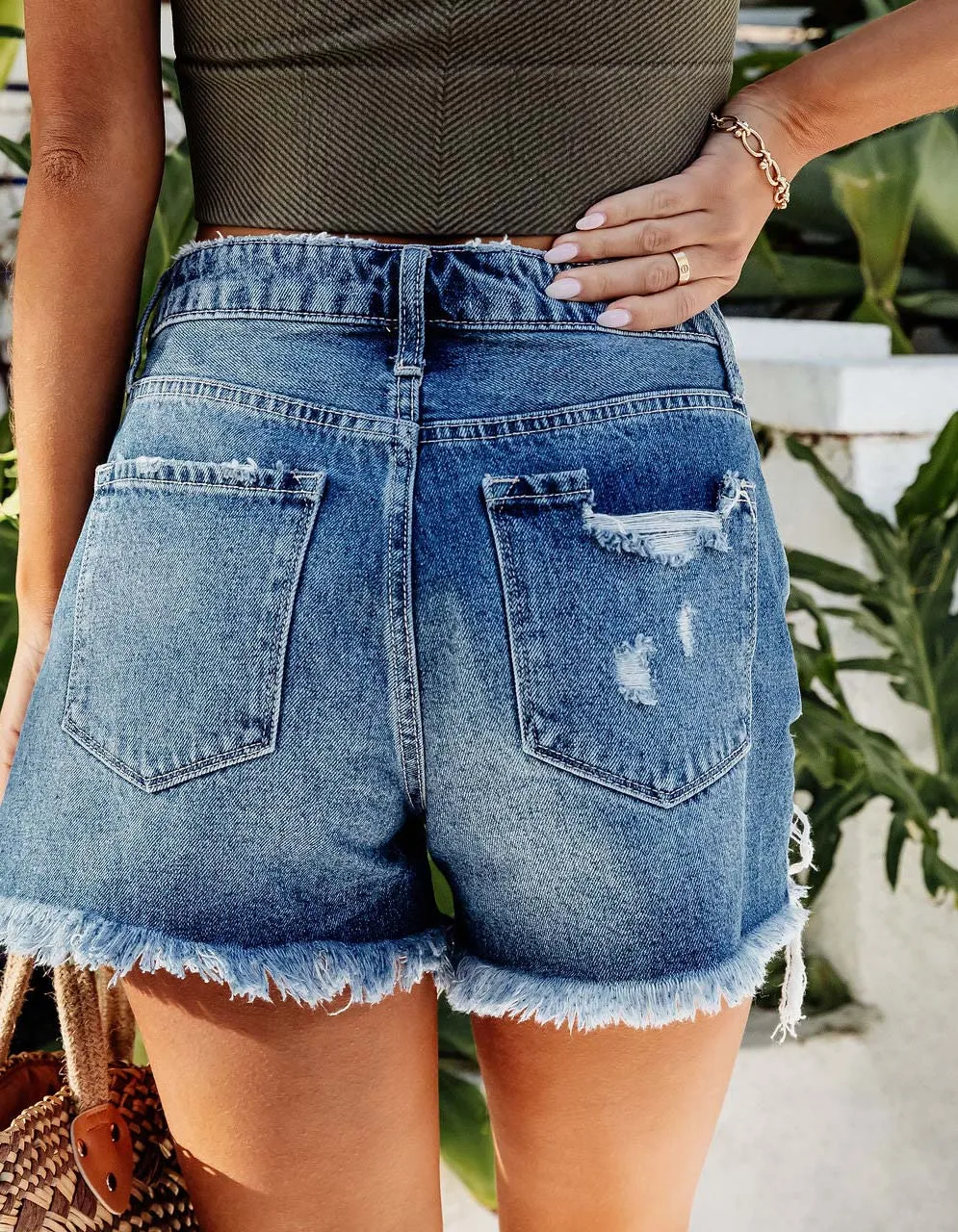 Solid-color Tassel Ripped Pocket Button High Waist Denim Shorts